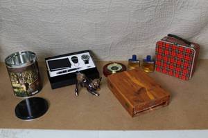 lot 40 image: Vintage Collectible Set with Barometer, Ceramic Calf, Cologne, Bible Box, and Gift Set