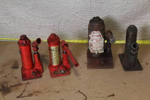 lot 58 image: Set of 4 Vintage Hydraulic Bottle Jacks 2 Ton and 5 Ton Rotunda