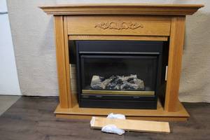 lot A-314 image: Majestic Gas Fireplace with Oak Wood Surround and Decorative Trim