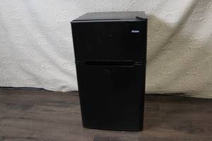 lot C-321 image: Haier 3.2 Cu Ft Compact Refrigerator Freezer, Model HC32TW10SB, Black