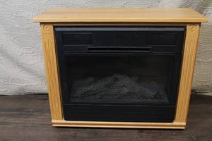 lot C-323 image: Heat Surge X23A Electric Fireplace with Remote and Oak Mantel