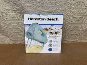 lot 116 image: Hamilton Beach 6-Speed Hand Mixer with Snap-On Case