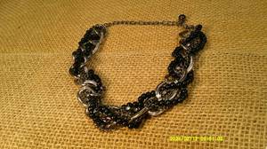 lot 101 image: Black & Silver Necklace, Earring, And Ring