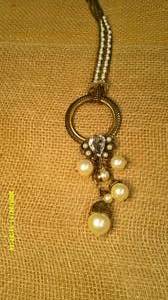 lot 63 image: Loop Necklace & Wreath Earring