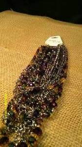 lot 76 image: Purple Multi-Strand Necklace & Silver Chain Wrapped Earrings
