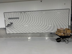 lot 71 image: Uline Slat Wall and Slat Wall Accessories. (Buyer responsible for removal from wall)