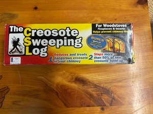 lot 94 image: Creosote Sweeping Log (New in Box)