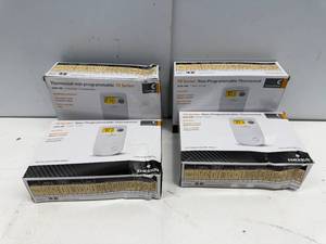 lot 36 image: LOT OF 4 EMERSON THERMOSTATS