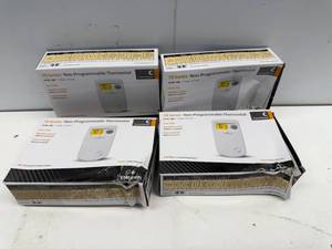 lot 37 image: LOT OF 4 EMERSON THERMOSTATS