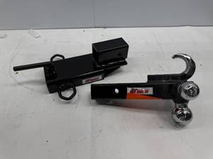 lot 130 image: EXTREME MAX HITCH RECIEVER WITH TRIBALL HITCH.