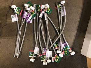lot 24 image: Lot of Fluidmaster 38 in. x 78 in. x 20 in. Stainless Steel Click Seal Toilet Connector Customer Returns See Pictures