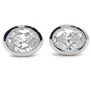 lot 18 image: 2 Carat Diamond Oval Bezel Solitaire Stud Earrings in 14k White Gold VIDEO
