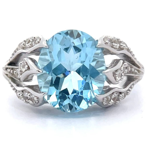 lot 51 image: 4.71 Carat Oval Blue & White Topaz Flower Ring VIDEO