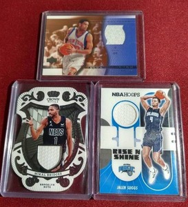 lot 28 image: (3) Basketball Jersey Cards