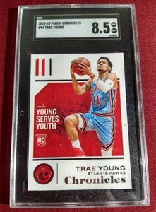 lot 95 image: 2018-19 Chronicles Trae Young Rookie Card - SGC 8.5
