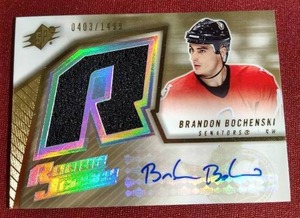 lot 142 image: 2005 Upper Deck Brandon Bochenski Rookie Patch Autograph Card - #d1499