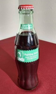 lot 207 image: 2000 Fighting Sioux Hockey Championship Coke Bottle