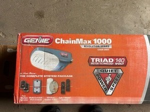 lot 3 image: Genie Garage door opener (Never used)