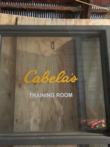 lot 11 image: commercial glass window from Cabelas store