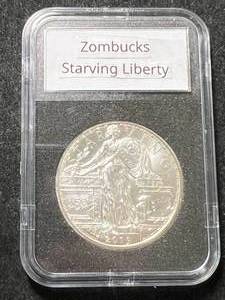 lot 53 image: 1 TROY OZ .999 FINE SILVER STARVING LIBERTY ZOMBUCKS ROUND SLABBED