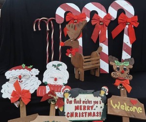lot 15 image: WOODEN OUTDOOR CHRISTMAS DECORATIONS.