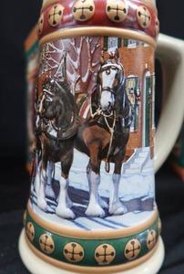lot 5 image: COLLECTIBLE BUDWEISER HOLIDAY STEINS.