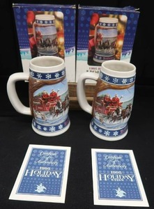 lot 6 image: COLLECTIBLE BUDWEISER HOLIDAY STEINS.
