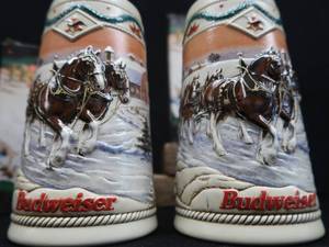 lot 7 image: COLLECTIBLE BUDWEISER HOLIDAY STEINS.