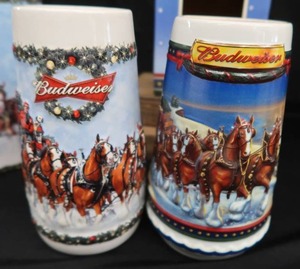 lot 9 image: COLLECTIBLE BUDWEISER HOLIDAY STEINS.