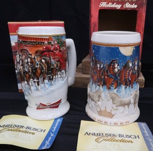 lot 10 image: COLLECTIBLE BUDWEISER HOLIDAY STEINS.