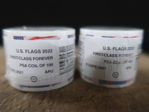 lot 57 image: 2 UNOPENED ROLLS OF FOREVER STAMPS