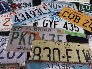 lot 60 image: 23 LICENSE PLATES