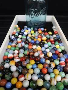 lot 84 image: VINTAGE MARBLES  BLUE BALL IDEAL LIDDED JAR