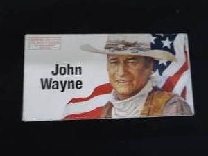 lot 94 image: COLLECTIBLE JOHN WAYNE COMMEMORATIVE .32-40 RIFLE CARTRIDGES