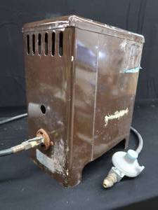 lot 98 image: AF THOMPSON FISH HOUSE STOVE