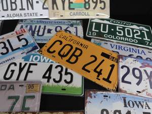 lot 60 image: 23 LICENSE PLATES