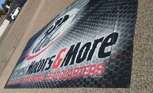 lot 806 image: HUGE Vinyl Banner Sign Midwest Motors and More.