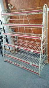 lot 902 image: 6 Teir Rolling Metal Display Rack.