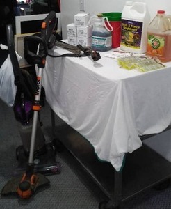 lot 653 image: Cleaning Supplies. Vacuum, Grill Cleaner, Murphys oil, and more.