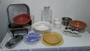 lot 665 image: Vintage Texas Ware, Fiesta Ware, GE AMFM Clock And More.
