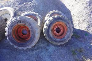 Set of 4 - Solideal Bobcat Skid Loader Tires on 8 Bolt Rims