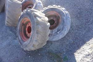 Set of 4 - Solideal Bobcat Skid Loader Tires on 8 Bolt Rims
