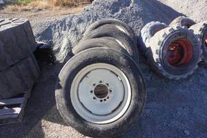 Set of 4 - Firestone T575 LP Radial Bobcat Snow Tires on 8 Bolt Rims