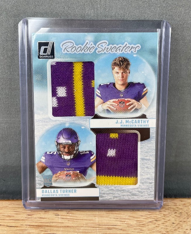 lot 46 image: 2024 Panini Donruss JJ McCarthy, Dallas Turner Rookie Sweaters #RHD-MIN