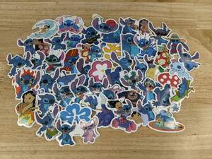 lot 153 image: 50 Disney Stitch Stickers - Brand New