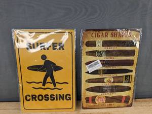 lot 167 image: 2 Metal 8 x 12 Inch Signs Surfer Crossing and Cigar Shapes - Brand New