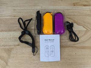 lot 208 image: Wireless Game Controller Joy-Pad Set for Switch - Brand New