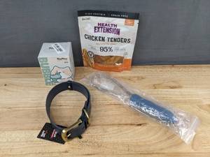 lot 502 image: Dog Care Bundle Treats, Tuff Pupper Collar, Shedding Brush, MayMaw Pet Toy - Brand New