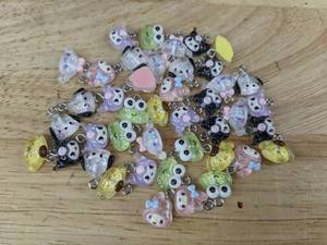 lot 51E image: 42 Hello Kitty and Friends Charms - Brand New