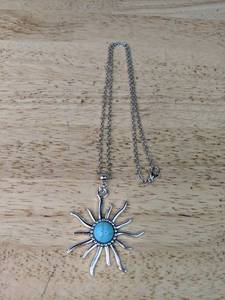 lot 424 image: Silver Tone Sun Pendant Necklace with Turquoise Accent - Brand New P